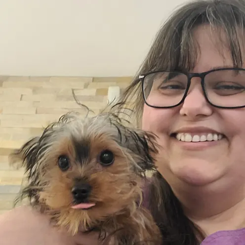 St. Catharines Animal Hospital staff with a Yorkie puppy